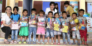 Children receiving school supplies 
